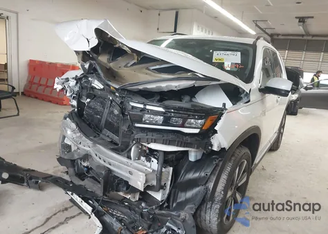 2023 Honda Pilot Awd Touring from USA, damaged, VIN 5FNYG1H71PB036197